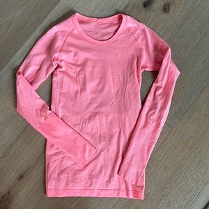 Salmon colored lululemon run swiftly long sleeve.